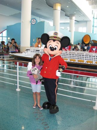 Captain Mickey greeting guests at the DCL Terminal