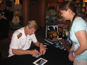 Captain Tom signing